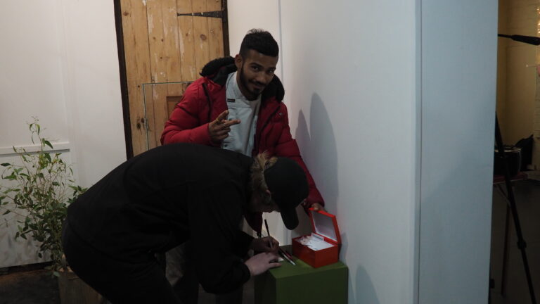 Attendees voting for the People's Choice Award